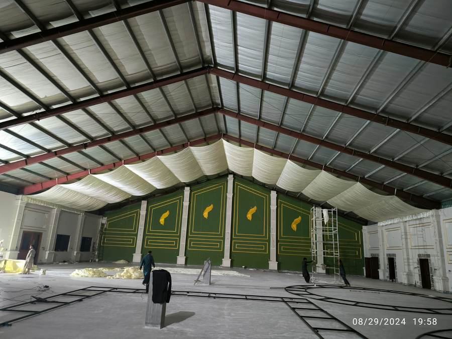 Commercial hall interior with decorative wall panelling and drape ceiling, Al Azeem Engineering Islamabad